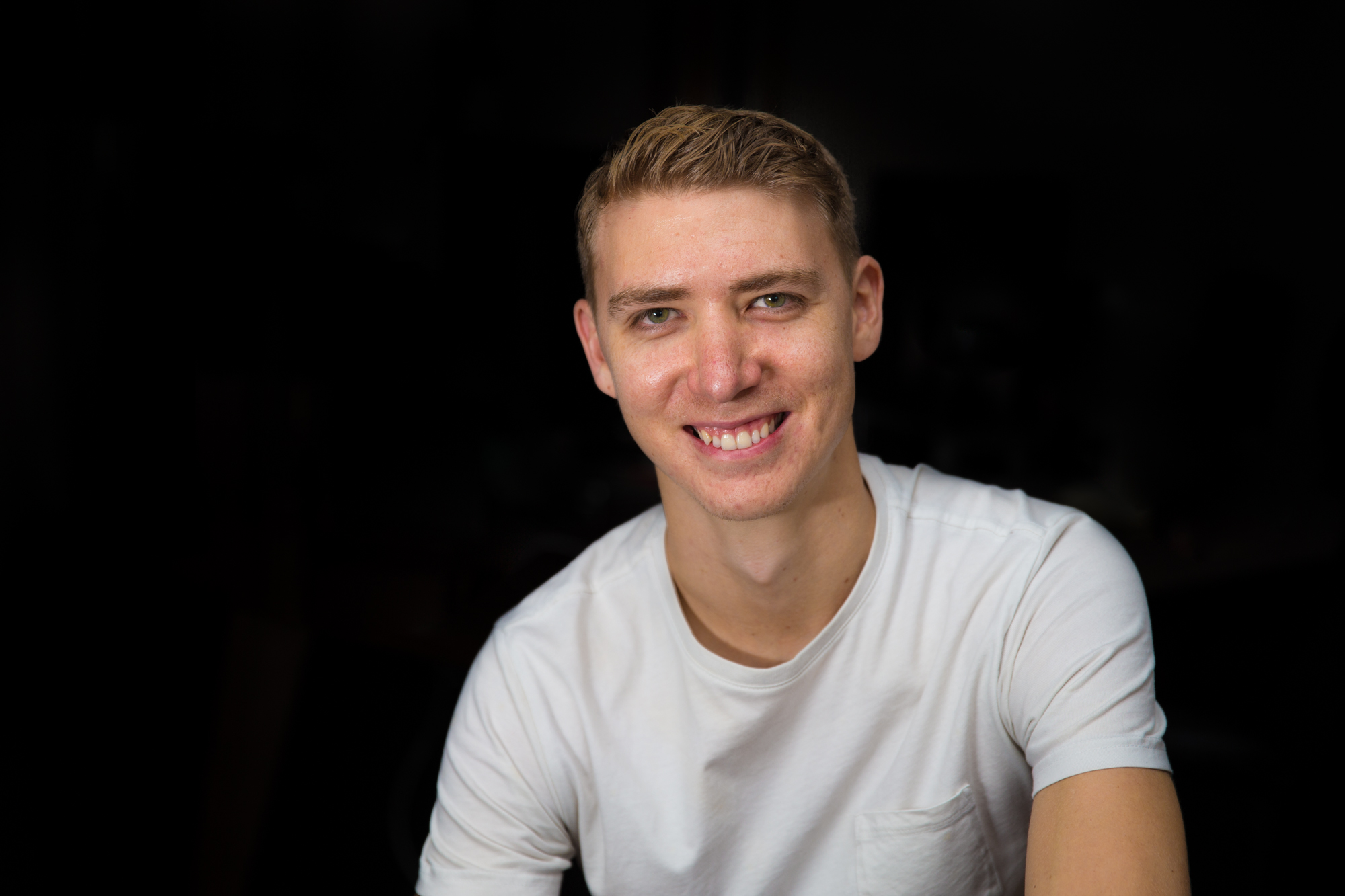 Upper body shot of Michael Benhayon smiling